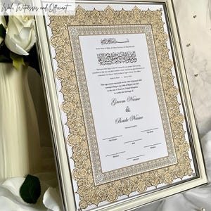 May include: A white framed document with gold calligraphy and an ornate border. The document is a Nikah certificate, a legal Islamic marriage contract. The text includes the Arabic phrase "In the Name of Allah, the Most Gracious, the Most Merciful." and the English text "This agreement was made on the 18th of January 2023 corresponding to 6th of Jumada Al-Awwal 1444 Hijri in the city of London, United Kingdom to certify the marriage of Groom Name & Bride Name."