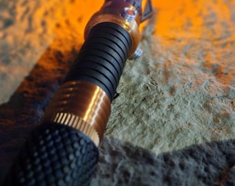 The Heretic Light up collapsible lightsaber!