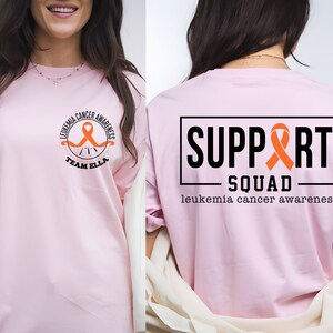 Camiseta de concienciación sobre la leucemia: Equipo de apoyo contra el cáncer con lazo naranja imagen 9