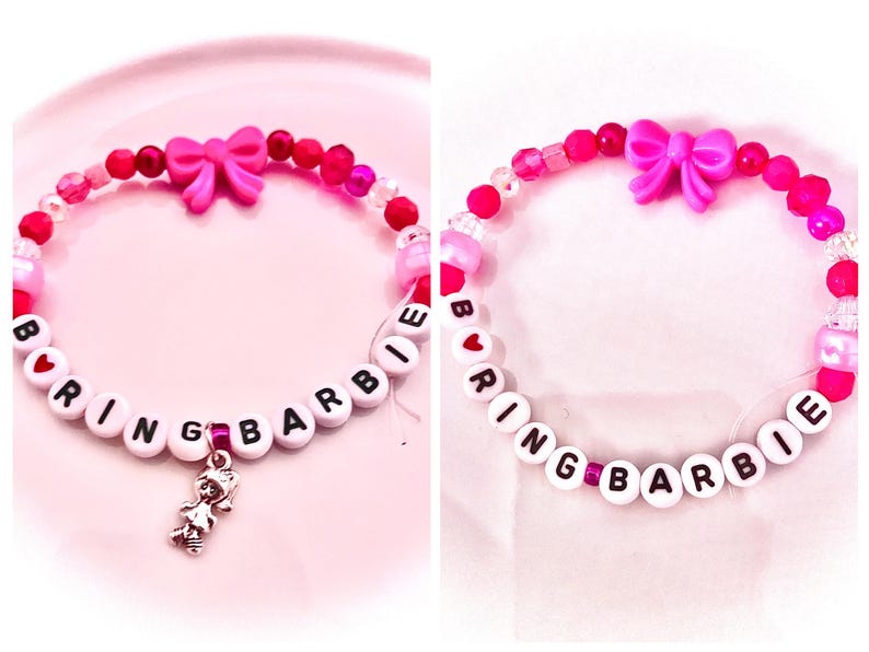A collage of two pink coquette-style bracelets inspired by Taylor Swift’s The Life of a Showgirl track “Actually Romantic.” One reads “Tacky,” and the other “Boring Barbie,” referencing the lyrics “I heard you called me Boring Barbie” and “You think I’m tacky, baby? Stop talking dirty to me.” These bracelets capture the song’s playful defiance and rumored connection to Charli XCX’s Brat “Sympathy Is a Knife.” Perfect for Swifties who love Taylor’s clever, feminine, and subtly savage storytelling