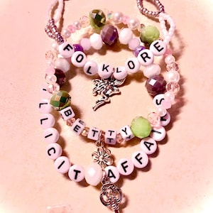 grey glass beaded bracelet, inspired by Taylor Swift&olklore* era, reflects the album's introspective and earthy tones A handcrafted piece for Swifties it captures the mystique and storytelling magic of the music, a perfect collectible accessory