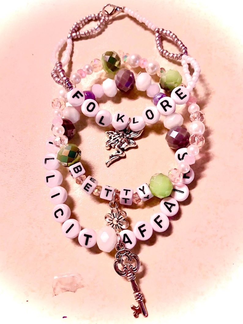 grey glass beaded bracelet, inspired by Taylor Swift&olklore* era, reflects the album's introspective and earthy tones A handcrafted piece for Swifties it captures the mystique and storytelling magic of the music, a perfect collectible accessory