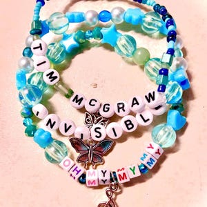 Embrace the youthful energy of Taylor Swift’s debut album with this bracelet Featuring a music butterfly charm, this bracelet symbolizes growth and creativity, making it a perfect tribute for any Swiftie who loves her early music and heartfelt lyrics