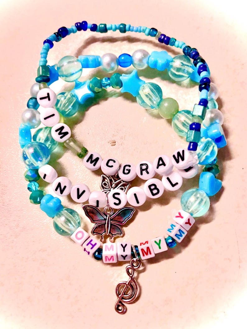 Embrace the youthful energy of Taylor Swift’s debut album with this bracelet Featuring a music butterfly charm, this bracelet symbolizes growth and creativity, making it a perfect tribute for any Swiftie who loves her early music and heartfelt lyrics