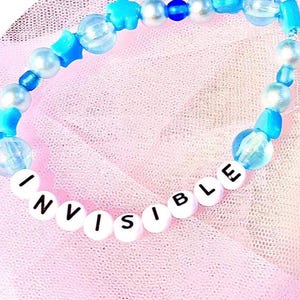 Embrace the heartfelt emotion of Taylor Swift’s debut album with this blue beaded bracelet, inspired by "Invisible." A perfect tribute to the song’s themes of longing and unspoken love For any Swiftie who connects with its deep, introspective lyrics.