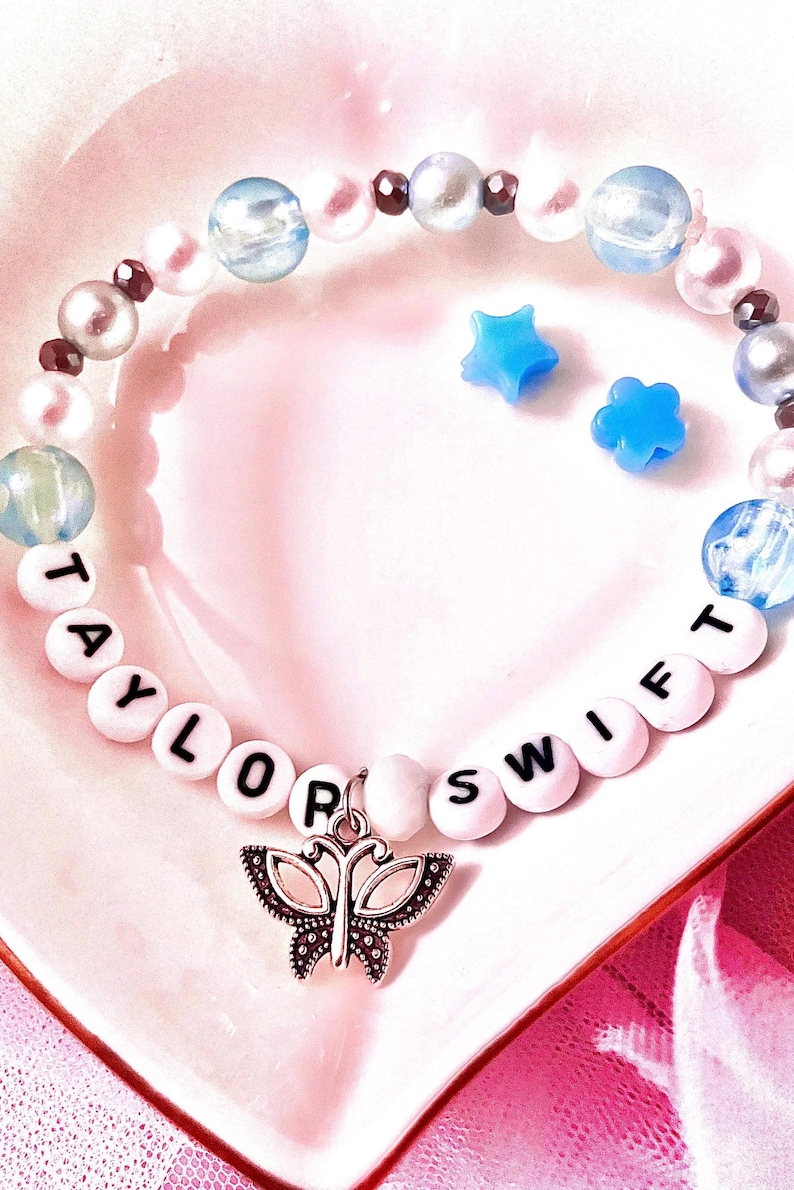 Celebrate the essence of Taylor Swift’s debut album with this bracelet. Featuring a music butterfly charm, this bracelet symbolizes both transformation and creativity, making it a perfect tribute for Swifties who cherish her early music.