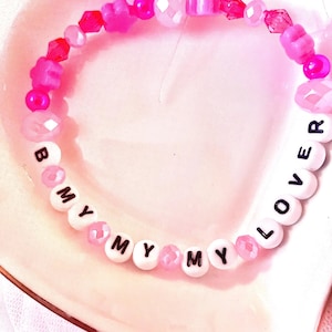 This is a motivational bracelet inspired by Taylor’s song “Daylight,” which says her famous quote: “I want to be defined by the things that I love, not the things that I hate.” She also sings “I once thought love would be burning red but it’s golden”