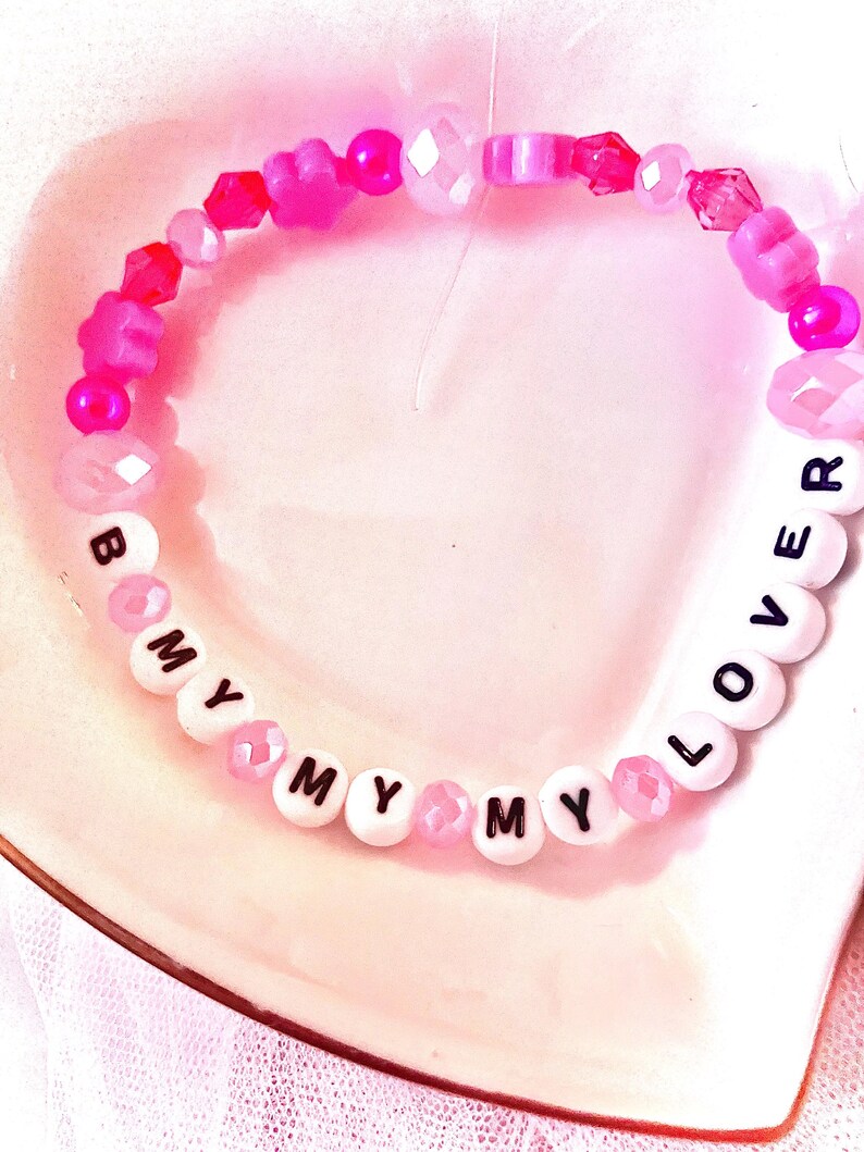 This is a motivational bracelet inspired by Taylor’s song “Daylight,” which says her famous quote: “I want to be defined by the things that I love, not the things that I hate.” She also sings “I once thought love would be burning red but it’s golden”