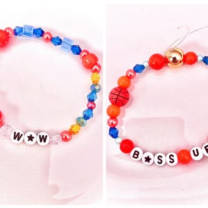 A vibrant collage featuring two Taylor Swift–inspired bracelets from The Life of a Showgirl: one orange “Boss Up” and one teal “Wow.” Inspired by her song “Wish List,” these bracelets capture the energy of the lyrics “Got me dreaming about a driveway with a basketball hoop” and “Boss up, settle down, I just want you.” Together, they embody ambition, love, and confidence—perfect for Swifties celebrating Taylor’s playful nods to romance and empowerment in her Showgirl era.