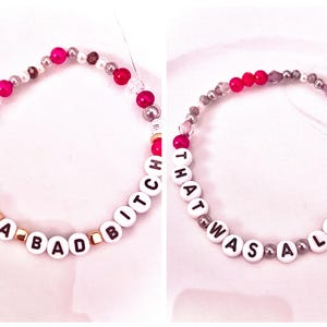 everyone’s so punk on the internet m The Life of a Showgirl: a red “Not a Bad Btch” and a gold “That Was a Lie.” Inspired by her track five, “Eldest Daughter,” the album’s most vulnerable song, these bracelets reflect the raw lyrics “I’m not a bad btch and this isn’t savage” and “When I said I don’t believe in marriage, that was a lie.” A heartfelt tribute to the song’s emotional honesty, perfect for Swifties who connect with Taylor’s introspective storytelling.