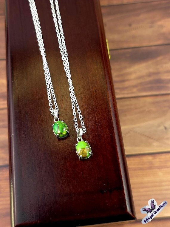Sterling Silver Necklace Featuring A Turquoise Stone.