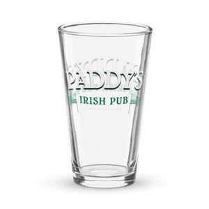 May include: A clear glass pint glass with the text "Paddy's Irish Pub" printed on the side.