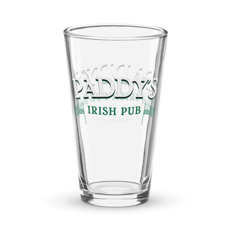 May include: A clear glass pint glass with the text "Paddy's Irish Pub" printed on the side.