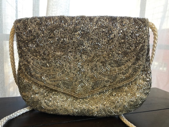 La Regale LTD Made in China. Gold Beaded Purse/clutch 