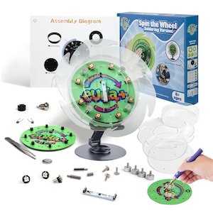 May include: A green and clear electronic kit labeled "Spin the Wheel (Soldering Version)" with an assembly diagram and various components. The kit includes a circuit board, LEDs, and a soldering iron. The box indicates the kit is for ages 8+.