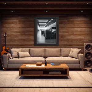 Captivating black and white Formula 1 car photograph showcasing sleek tires and chassis in a modern garage. Great gift for racing fans, adding masculine decor and dynamic energy to any space, including man caves. f1 wall art, f1 poster