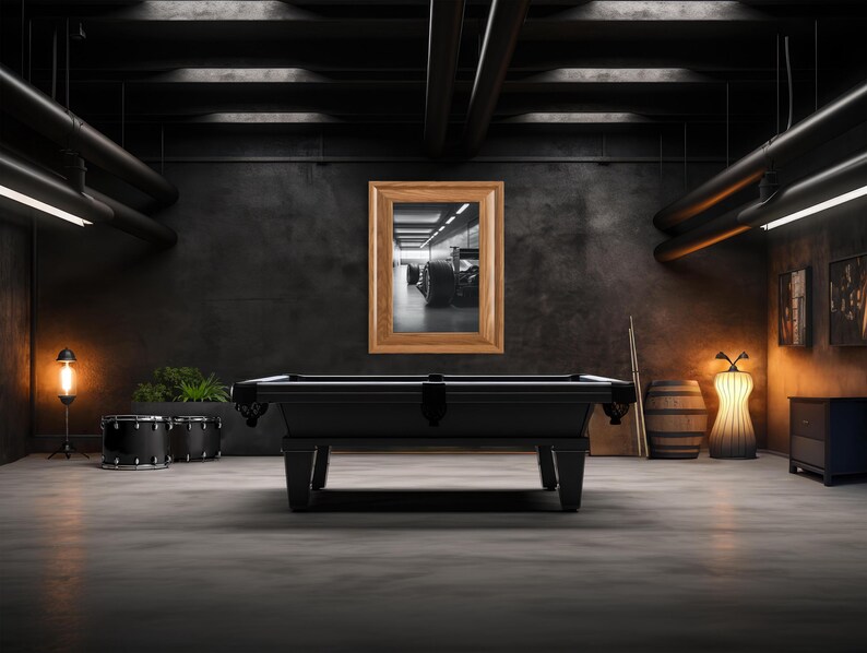 Artistic black and white photo of Formula 1 car in sleek garage space, capturing the power and sophistication of motorsport design. Adds masculine style to any man cave or office, a great gift for car racing fans. f1 wall art, f1 poster