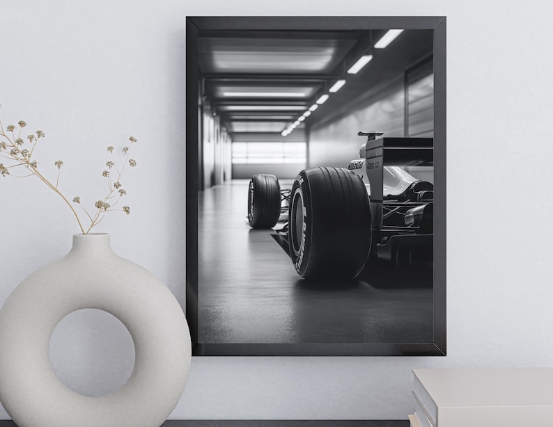 High-definition close-up shot of a Formula 1 car's rear end, showcasing the intricate design of its tires and suspension. This motorsport wall art makes an ideal gift for race car enthusiasts and masculine decor seekers. f1 wall art, f1 poster