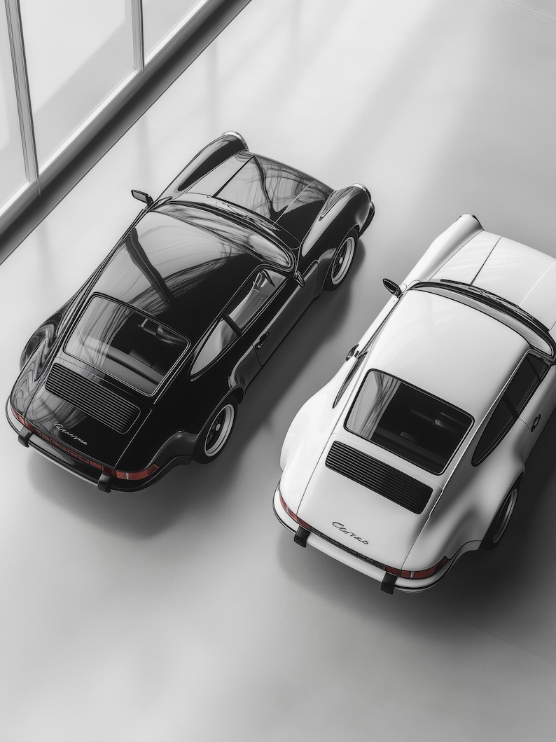 Two iconic Porsche 911s from a top-down view, high-quality art print brings sophistication and style to any room. Ideal for car lovers, this piece makes a unique addition to man caves, garages, or office decor, celebrating classic automotive design.