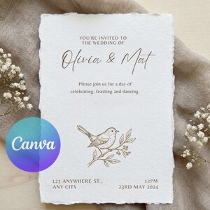 Pode incluir: Convite de casamento em papel branco texturizado. O convite apresenta os nomes "Olivia & Mat" e o texto "Você está convidado para o casamento de". Inclui uma ilustração detalhada de um pássaro num galho. A data é 23 de maio de 2024.