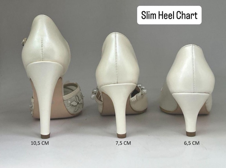 May include: Three pairs of ivory-colored slim heel shoes are displayed, showcasing different heel heights. The heels measure 10.5 cm, 7.5 cm, and 6.5 cm. The image includes the text "Slim Heel Chart".