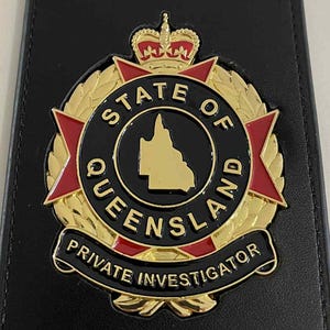 Insignia y billetera de investigador privado de Queensland: réplica de calidad niquelada en oro.