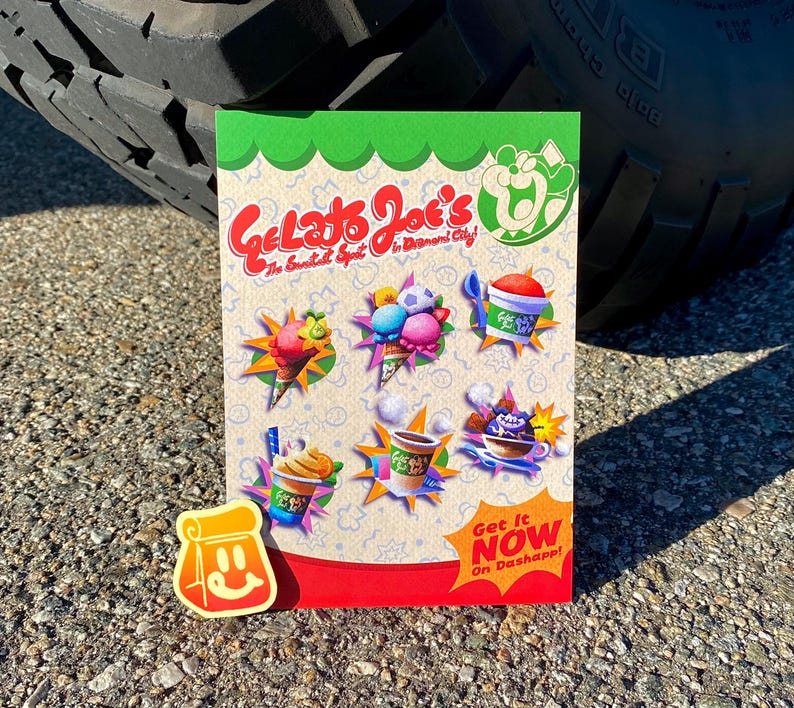Op de afbeelding: Een rechthoekige flyer voor Gelato Joe's met de tekst Gelato Joe's The Sweetest Spot in Banana City! en Get It Now On Dashapp! Het ontwerp toont kleurrijke illustraties van ijs, ijscoupes en drankjes met een kleine sticker van een tas.