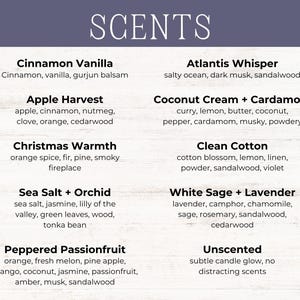 May include: A white board with a list of candle scents, including Cinnamon Vanilla, Apple Harvest, Christmas Warmth, Sea Salt + Orchid, Peppered Passionfruit, Atlantis Whisper, Coconut Cream + Cardamom, Clean Cotton, White Sage + Lavender, and Unscented.
