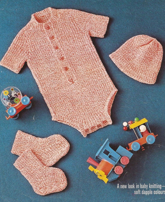 knitted baby grow