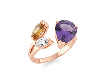 Anillo abierto de tres piedras preciosas: amatista pera, citrino marquesa y circón blanco