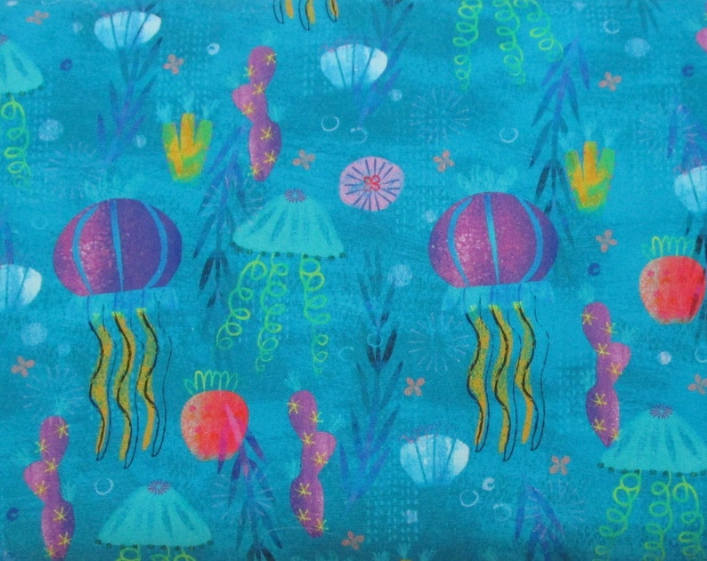 May include: A teal blue fabric with a repeating pattern of purple, blue, and yellow jellyfish, coral, and seaweed. The background is a light blue with white dots.