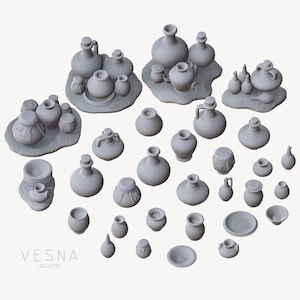 May include: A collection of miniature grey unpainted resin pottery items including various jugs, jars, bowls, and vessels, some grouped on textured bases, with the text VESNA SCULPTS printed in the bottom left corner of the image.