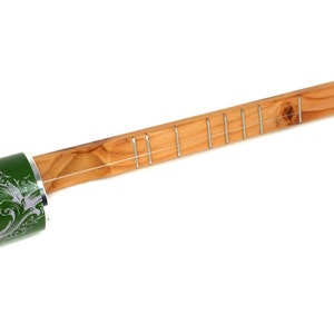 May include: A wooden cigar box guitar with a green can body. The can has the text "American Canjo Company" printed on it.