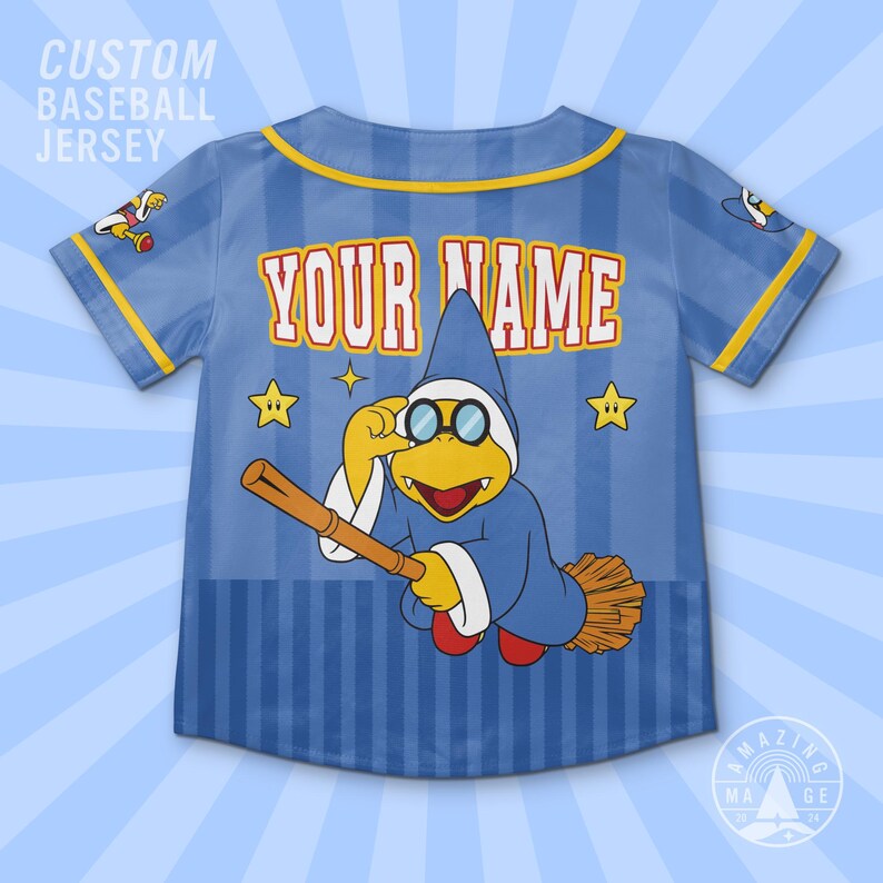 May include: A light blue striped baseball jersey featuring the text "YOUR NAME" in orange and white, a yellow-skinned character in a blue robe and hat riding a broomstick, yellow stars, and small character graphics on the sleeves.