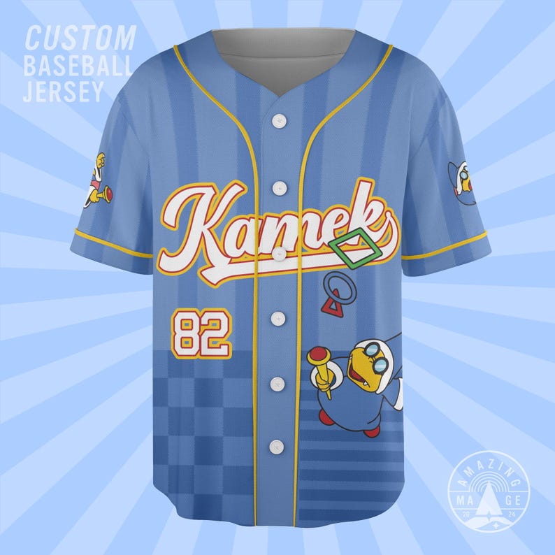 May include: A light blue baseball jersey featuring vertical stripes, a button-down front, and yellow trim. The chest displays the text Kamek in white with yellow outlines, the number 82, and a graphic of a character holding a wand.