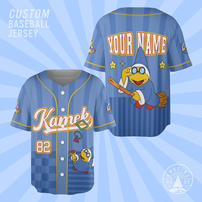 May include: A light blue baseball jersey with vertical stripes and a checkered pattern at the bottom. The front features the text Kamek, the number 82, and a Kamek character. The back displays the text YOUR NAME and a Kamek character on a broom.