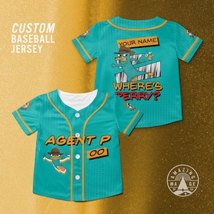 May include: Teal baseball jersey with orange trim and white buttons. The jersey features the text "AGENT P 00" and a cartoon platypus. The back of the jersey has the text "YOUR NAME" and "WHERE'S PERRY?"