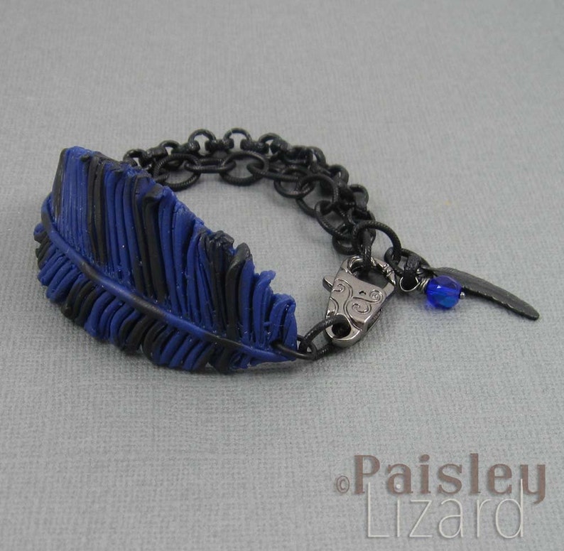 blue black polymer clay feather on matte black chain with lobster clasp Blue Jay feather bracelet