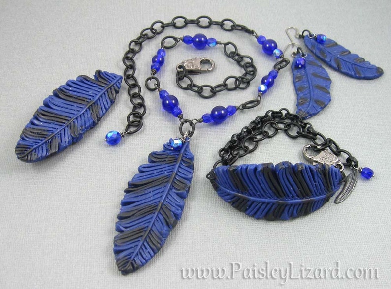 blue black polymer clay feather on matte black chain with lobster clasp Blue Jay feather bracelet