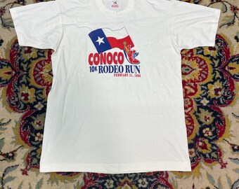 Camiseta vintage Conoco Rodeo Run 1995, fabricada en EE. UU., con costura simple, color blanco, talla M.