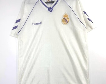 Camiseta vintage del Real Madrid Hummel blanca y morada, talla L.