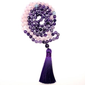 Rose Quartz Mala &#39;Amrita&#39; is a hand-knotted Rose Quartz Mala necklace that combines the energy of Rose Quartz and Amethyst.