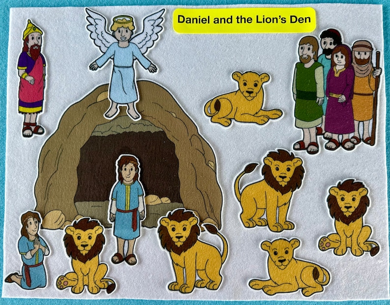 May include: A felt play set depicting the biblical story of Daniel and the Lion's Den. The set includes figures of Daniel, an angel, lions, and the king's men. The set also includes a brown felt cave with a large opening.
