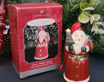 Hallmark Keepsake Ornament 1998/25 Years of Collecting Memories/Ceramic "Santa's Hidden Surprise" Trinket Box Ornament/Made in Sri Lanka.