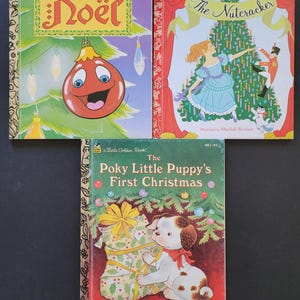 K&ouml;nnte beinhalten: Drei Vintage Little Golden B&uuml;cher mit Weihnachtsthemen. Titel sind "No&euml;l", "The Nutcracker" und "The Poky Little Puppy's First Christmas". Die Cover zeigen farbenfrohe Illustrationen von Urlaubsszenen und -figuren.