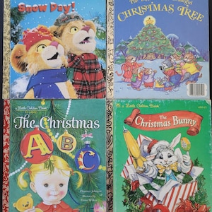 K&ouml;nnte beinhalten: Vier Vintage Little Golden B&uuml;cher. Titel sind "Between the Lions Snow Day!", "The Biggest, Most Beautiful Christmas Tree", "The Christmas ABC" und "The Christmas Bunny". Jedes Buch hat farbenfrohe Illustrationen.
