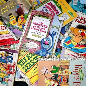 May include: A selection of vintage children's books, many from the 'Little Golden Book' series, featuring Sesame Street characters. Titles include "The Monster at the End of This Book" starring Grover, and "What's Up in the Attic?"