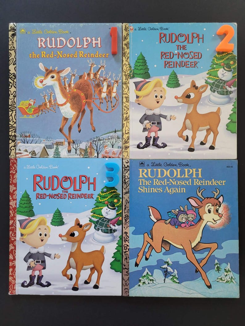 K&ouml;nnte beinhalten: Vier Vintage Little Golden B&uuml;cher mit Rudolph, dem Rentier mit der roten Nase. Die Cover zeigen Illustrationen von Rudolph, dem Weihnachtsmann und anderen Figuren in Winterszenen. Die B&uuml;cher sind mit 1, 2, 3 und 4 nummeriert.