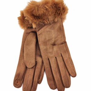 May include: Brown suede gloves with a faux fur cuff. The gloves have a simple design and are perfect for cold weather.