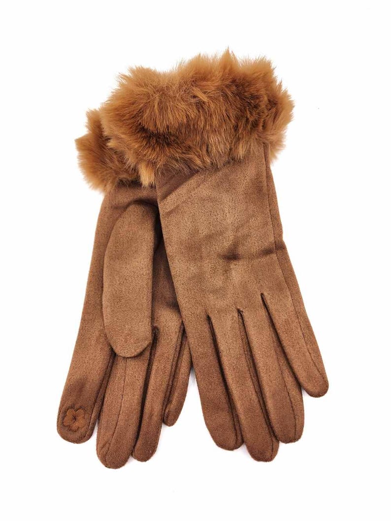 May include: Brown suede gloves with a faux fur cuff. The gloves have a simple design and are perfect for cold weather.